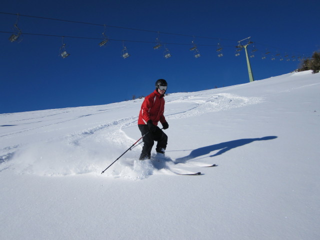 Michael neben dem 3er-Sessellift B&uuml;rgeralm